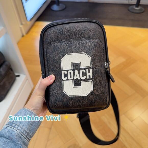 NWT COACH Men's Racer Sling Pack With Varsity Motif CAT80 Walnut Multi - Picture 1 of 9